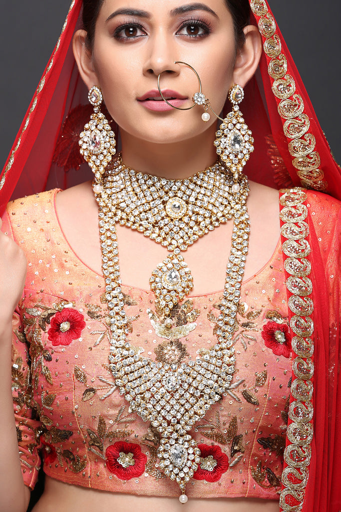 Bridal jewellery on hot sale red lehenga