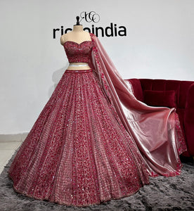 BRONZE ORGANZA LEHENGA WITH RED & HOT PINK BEADING