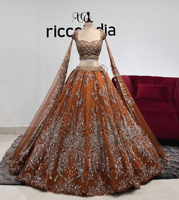 COPPER FLARED LEHENGA WITH CAPES