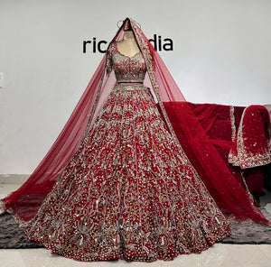 RED FLARED LEHENGA WITH DUPATTA AND VEIL