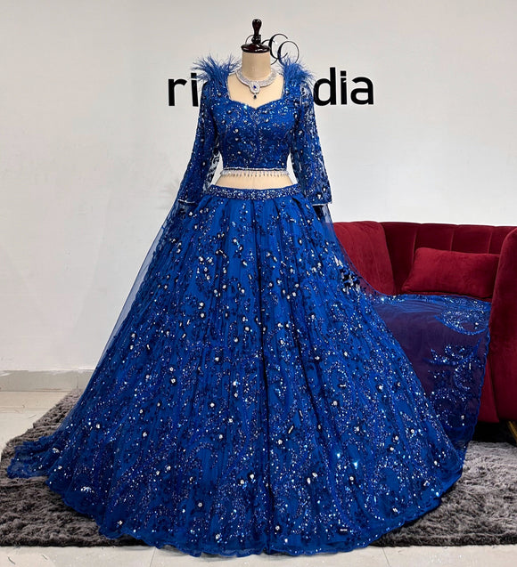 ROYAL BLUE TONE ON TONE LEHENGA WITH FEATHER SHOULDER