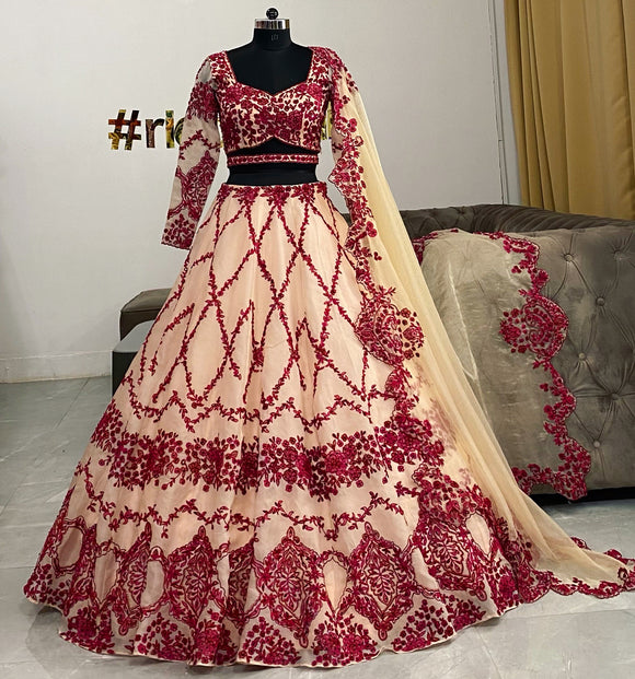 Beige organza lehenga with pink dori work