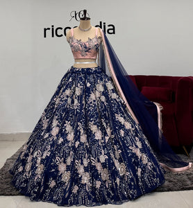 BLUE FLARED LEHENGA WITH PINK CORSET TOP