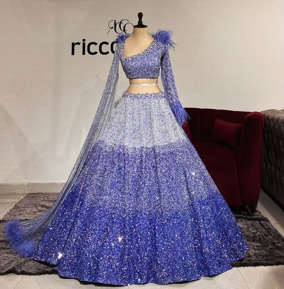 OMBRE LAVENDER LEHENGA WITH HEAVY BEADWORK & FEATHER DETAIL TOP