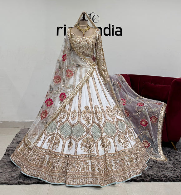 IVORY BRIDAL LEHENGA WITH COLORFUL PANEL EMBROIDERY DUPATTA